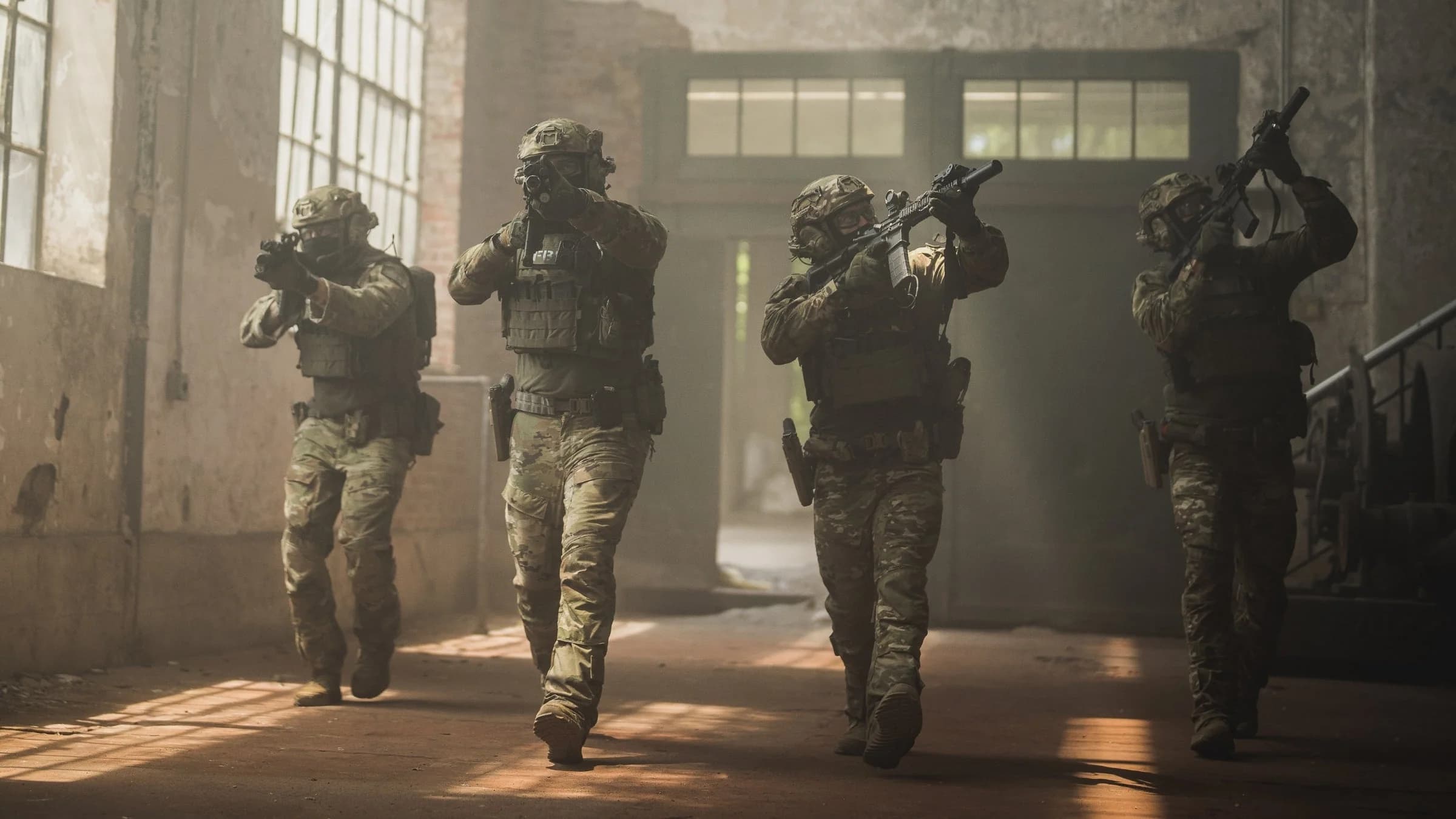 Tactical team moving together inside a training facility